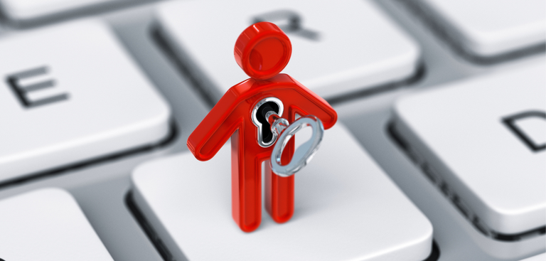 Pequeno boneco sobre o teclado de um computador. Inserida no peito desse boneco está uma chave, que pode indicar abertura ou fechamento, dependendo da interpretação do leitor Pequeno boneco sobre o teclado de um computador. Inserida no peito desse boneco está uma chave, que pode indicar abertura ou fechamento, dependendo da interpretação do leitor